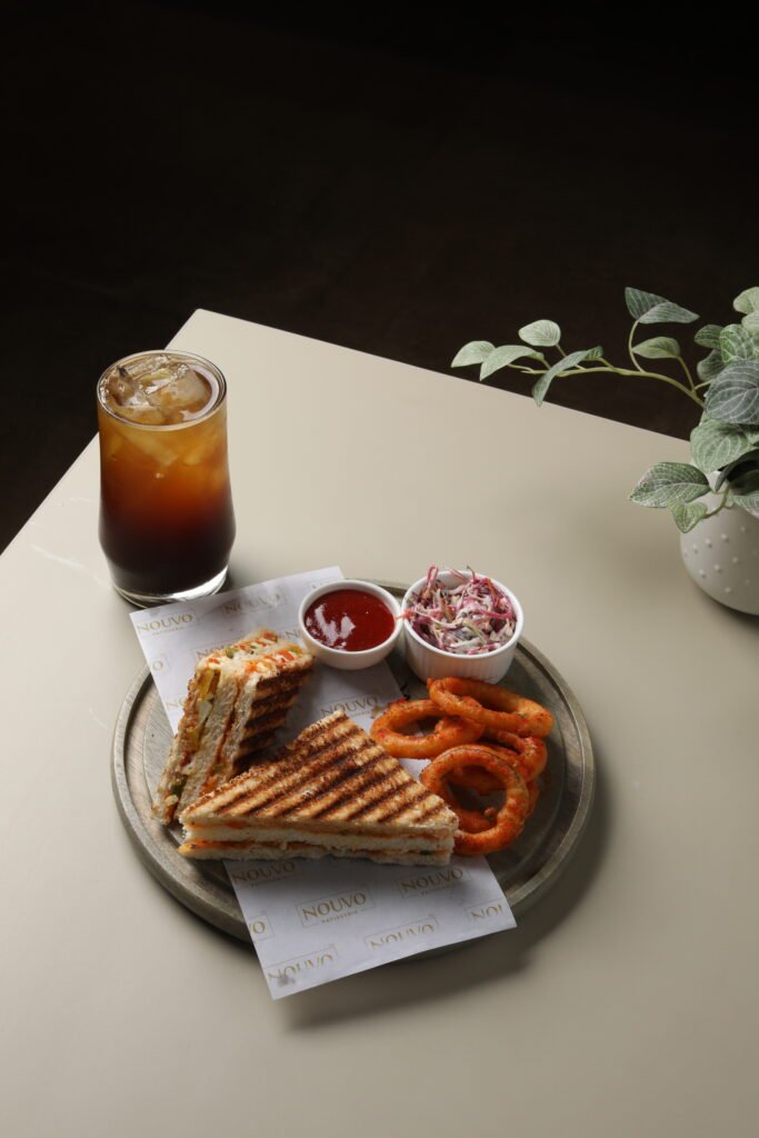 veg grilled sandwich with onion rings